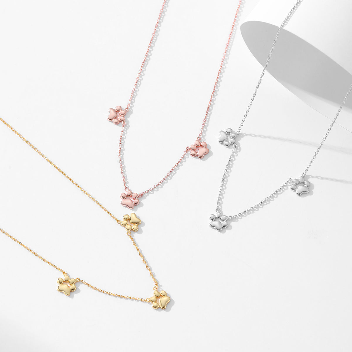 Teeny Tiny Trinity Paw Necklace